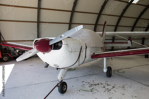 Skydiving plane in garage, little private propellers