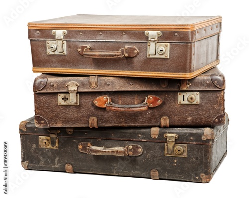 Old suitcases isolated on white background