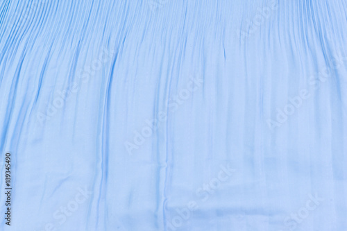 Texture of blue fabric pleated