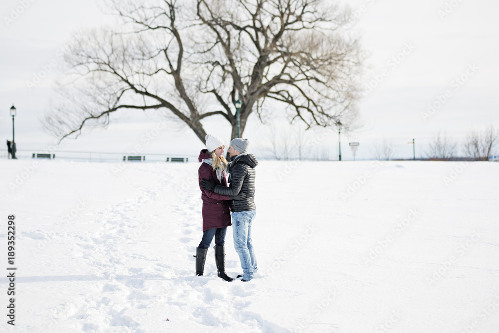 Young couple outside in winter