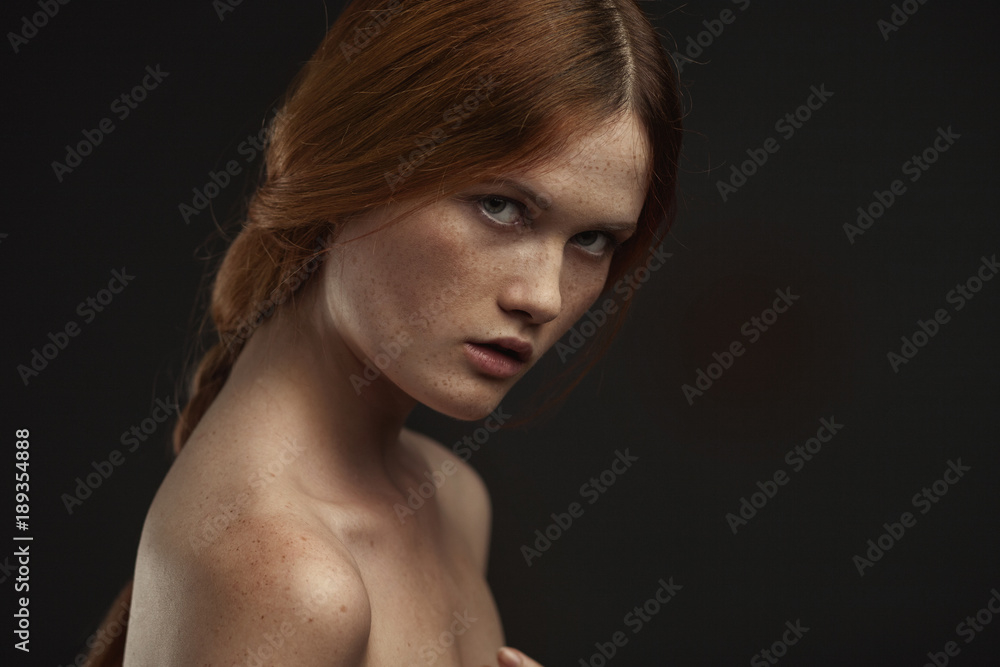 young beautiful woman with red hair posing young beautiful woman with red hair posing