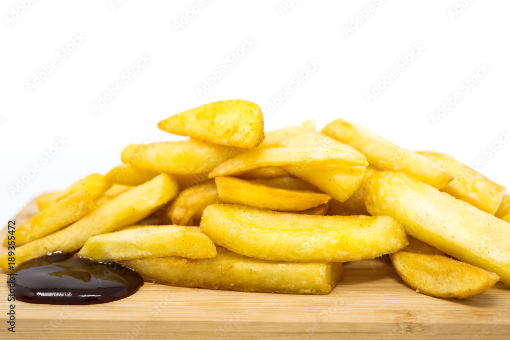 Golden French fries potatoes ready to be eaten Golden French fries potatoes ready to be eaten