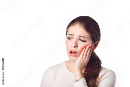  Dental care and toothache.Teeth Problem. Woman Feeling Tooth Pain. Closeup Of Beautiful Sad Girl Suffering From Strong Tooth Pain. Attractive Female Feeling Painful Toothache. Dental Health And Care 