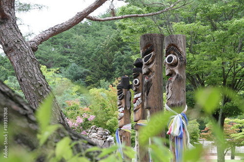 Korean traditional totem pole at the village entrance photo