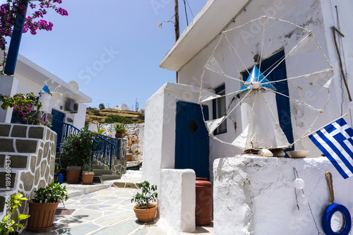 Fototapeta Naklejka Na Ścianę i Meble -  Street view in Driopis (Driopida), the traditional village of cycladic island Kythnos in Greece