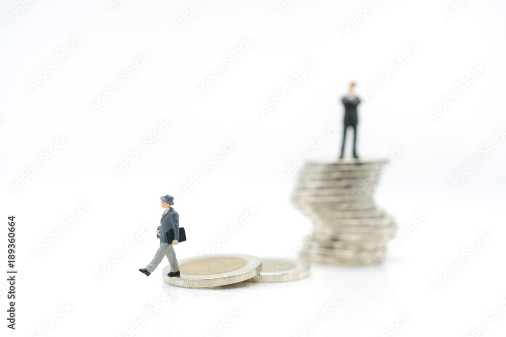 Miniature toy: Business man walk away after not success business like that man , business ,financial, not Success, Business Growth concept. Miniature toy: Business man walk away after not success business like that man , business ,financial, not Success, Business Growth concept.