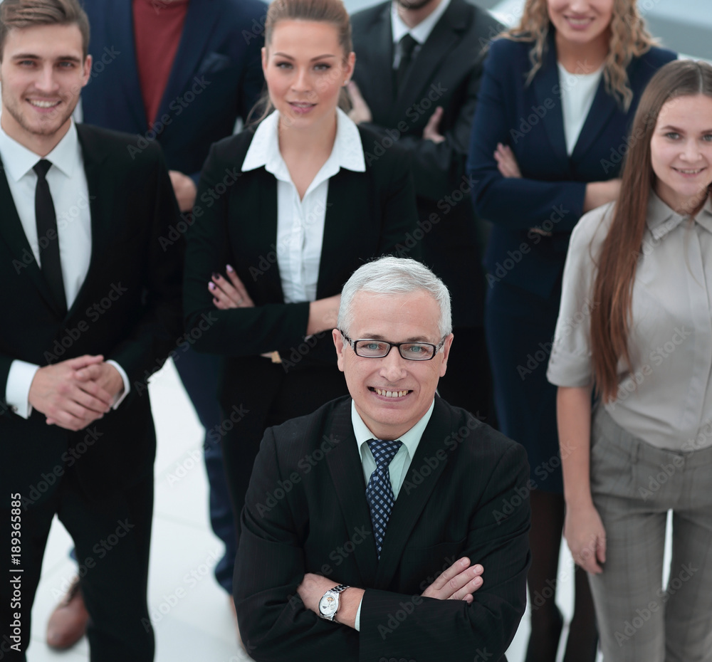 Fototapeta premium view from the top. group of smiling business people looking at camera.