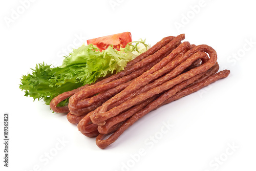 Kabanos. Polish long thin dry sausage made of pork. Isolated on white background.