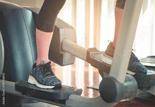 Foot working out on stepper exercise machine photo