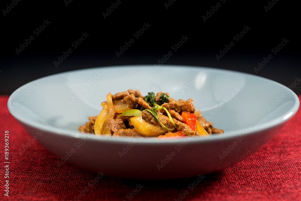 wok fried chicken stir fry with sweet peppers and chinese vegetables wok fried chicken stir fry with sweet peppers and chinese vegetables