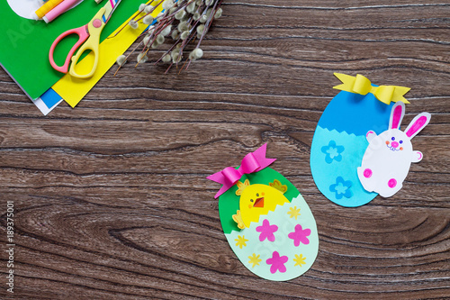 Children's easter egg gift with toy chicken and easter bunny. Handmade. Project of children's creativity, handicrafts, crafts for kids.