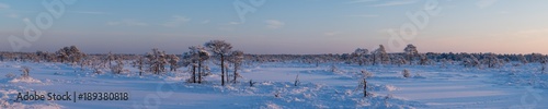 Beauty sunrise in bog Kakerdaja in cold winter morning