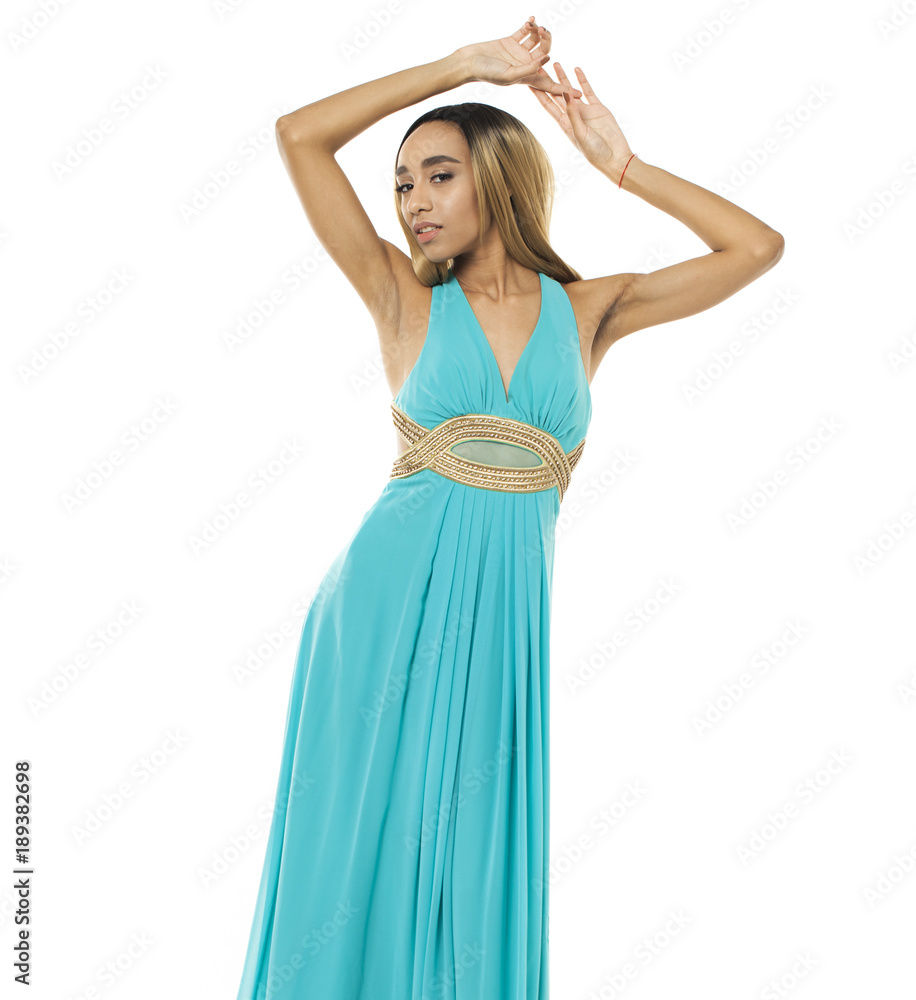 Portrait of a beautiful young african woman in a turquoise dress Portrait of a beautiful young african woman in a turquoise dress