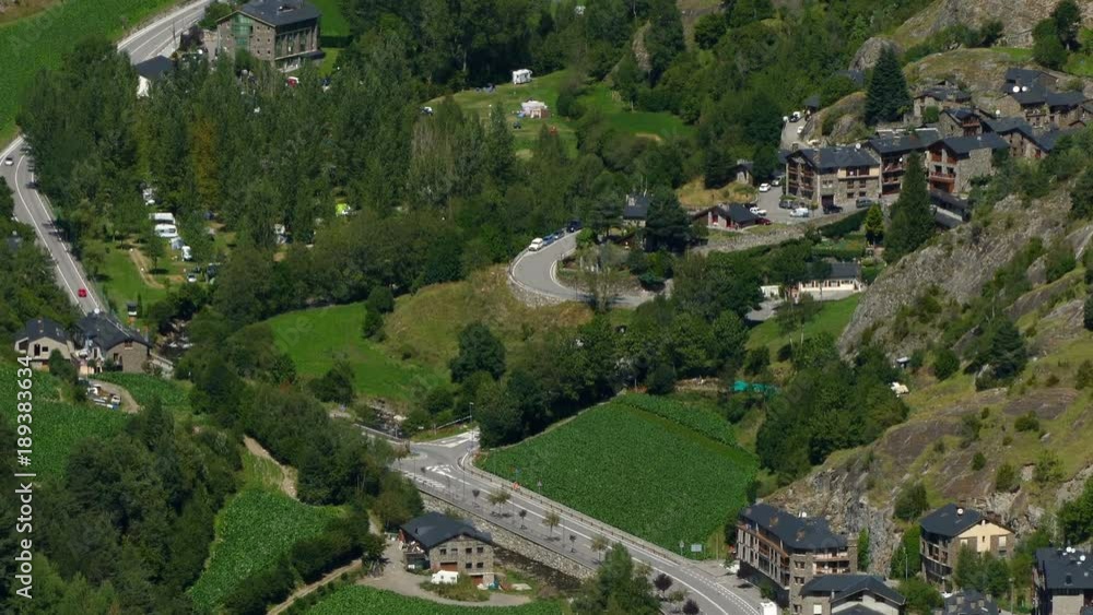 Andorra from above. Smooth camera movement: Tilt down.Panoramic aerial view of the valley bottom of Andorra from above. Smooth camera movement: Tilt down.Panoramic aerial view of the valley bottom of