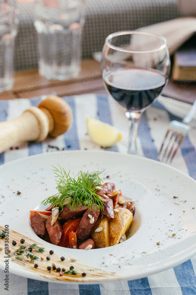 Warm salad with potatoes and grilled sausage Warm salad with potatoes and grilled sausage