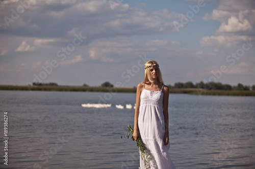 a young innocent girl at the lake