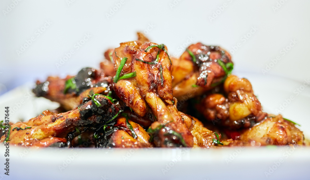 Thai chicken wings in closeup Thai chicken wings in closeup