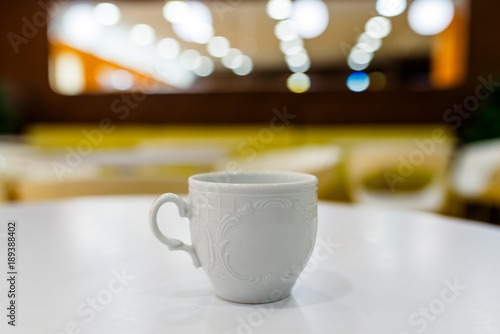 White Cup on the white table.