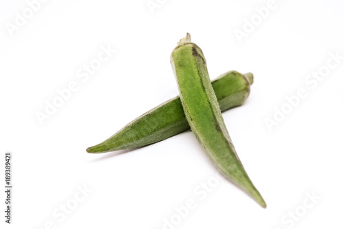Lady Fingers or Okra. White isolated background. Space for text