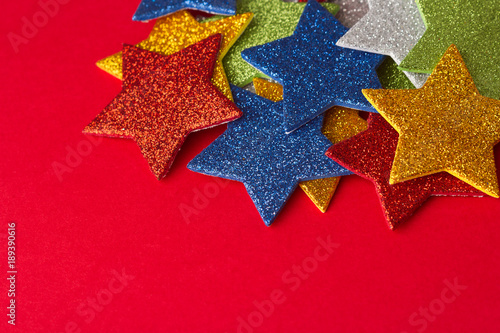 set of glittering stars on red background