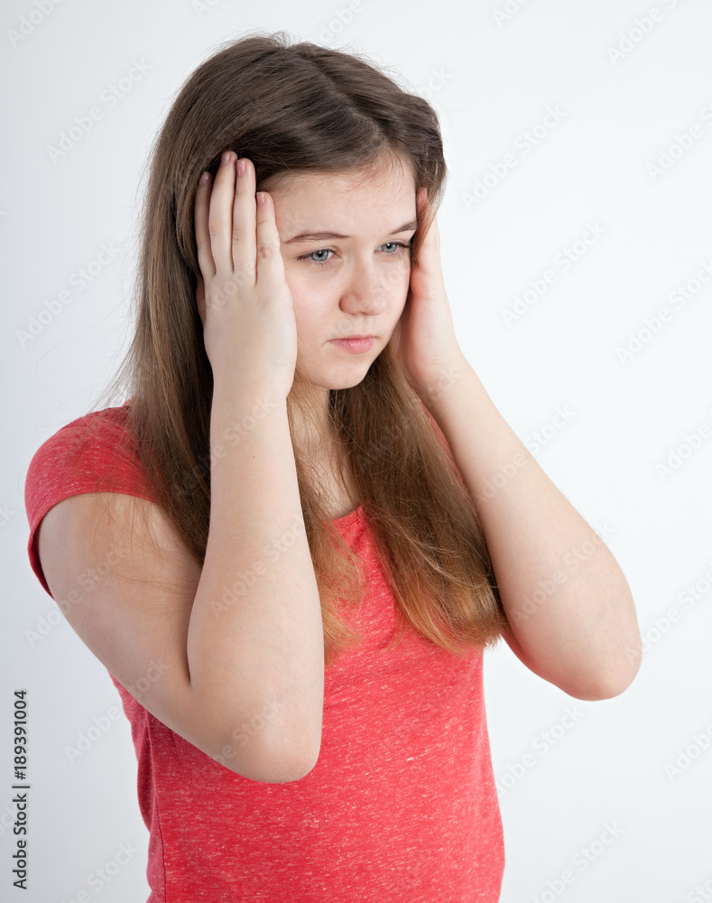girl closing her ears girl closing her ears
