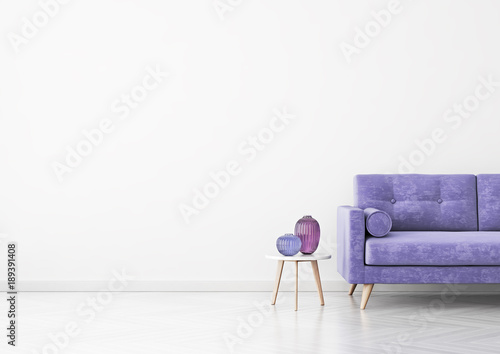 Livingroom interior wall mock up with violet velvet sofa, vases and coffee table on empty white background. 3D rendering.