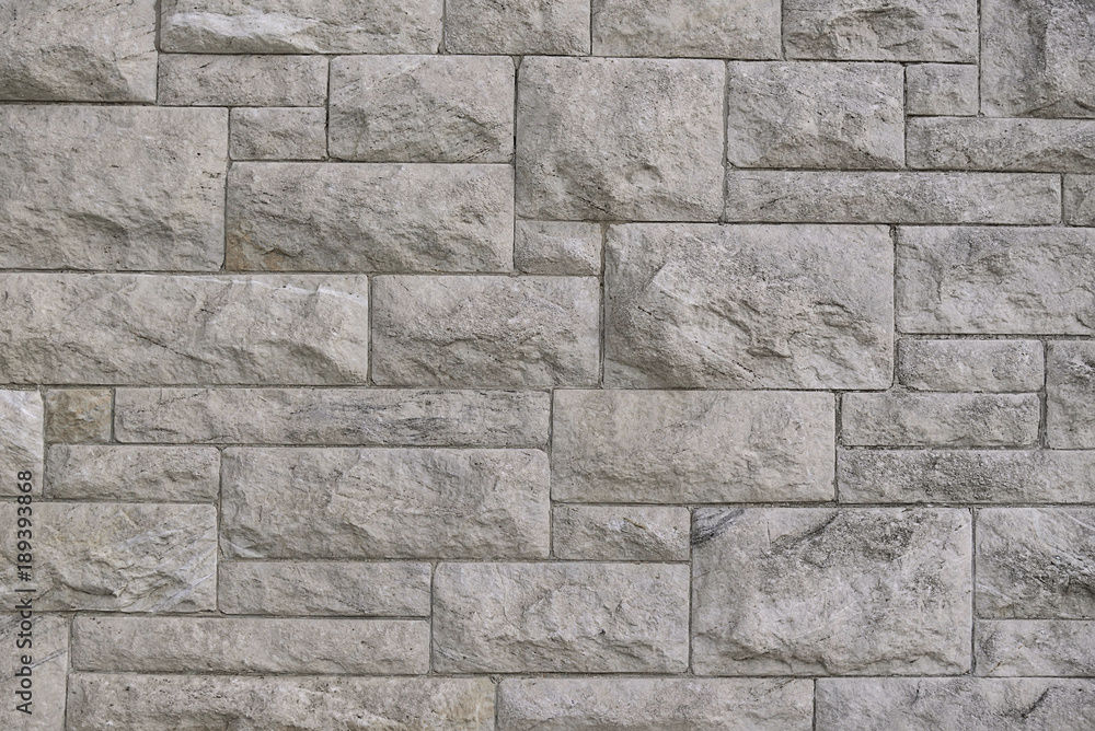 Fototapeta premium Modern grey stone wall background texture