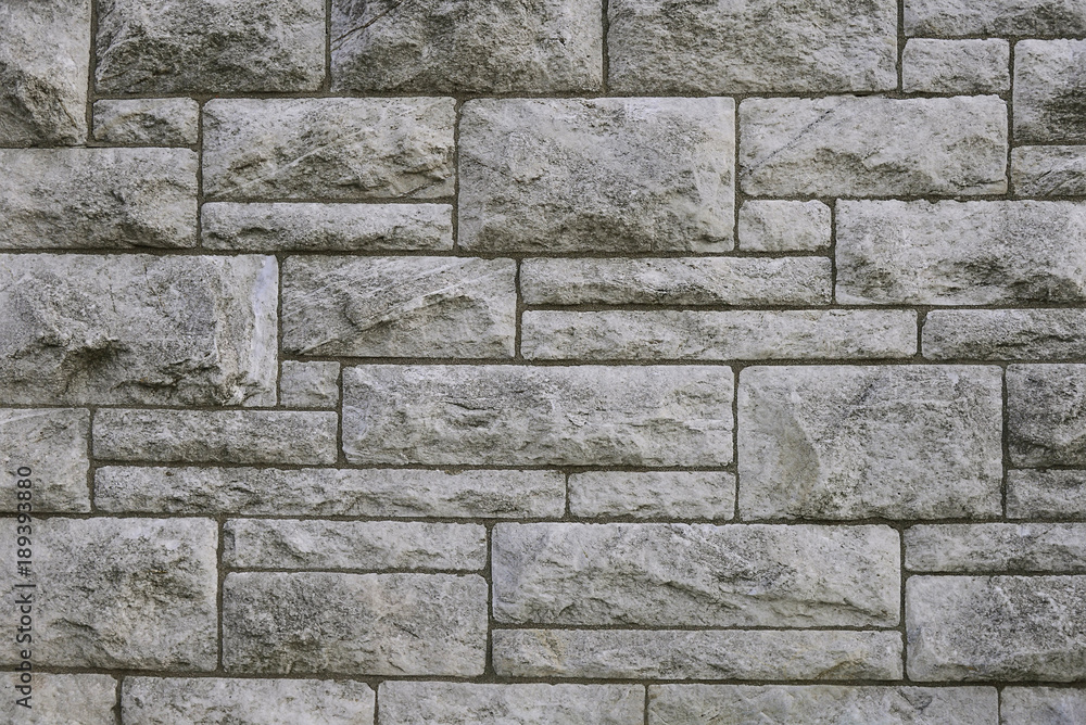 Fototapeta premium Modern grey stone wall background texture