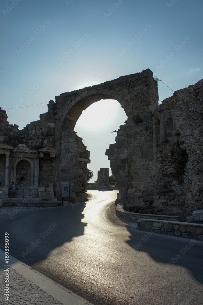 Old arc and ruins at sunset time