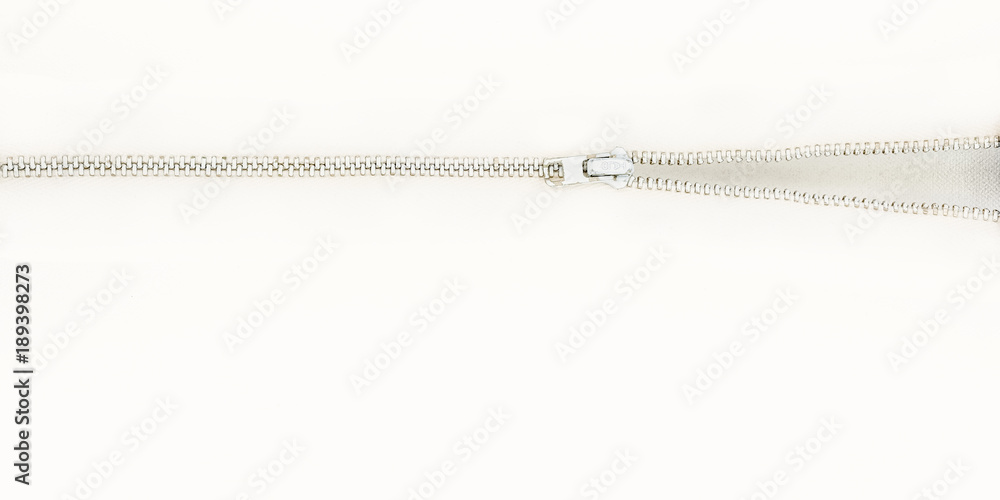 A zipper opening on a bright white background with lots of negative space.