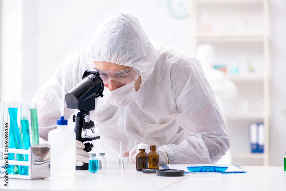 Two chemists working in the lab Two chemists working in the lab