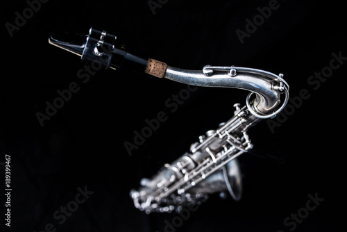 Full view from above of a silver saxophone