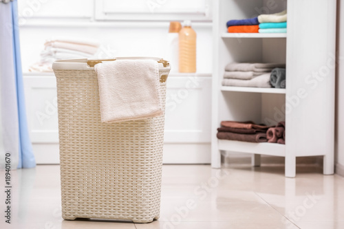 Plastic laundry basket with...