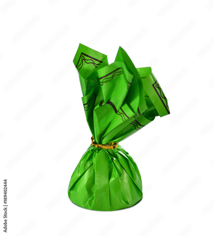Green sweet with gold ribbon isolated