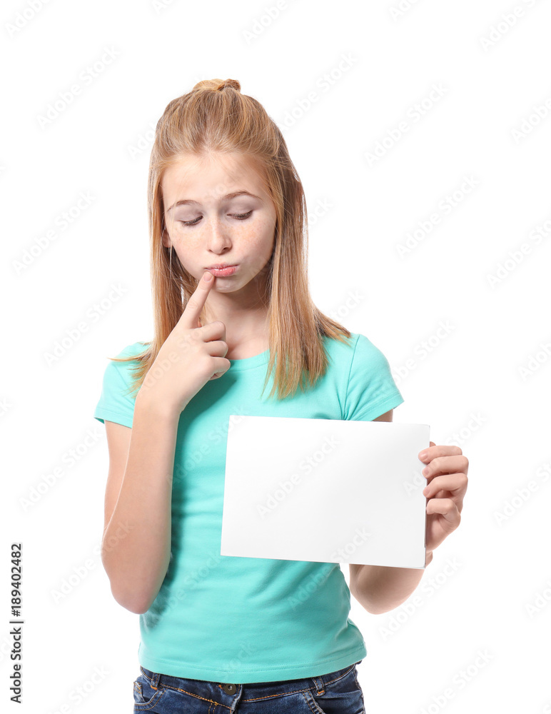 Cute girl with blank sheet of paper for advertising on white background
