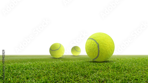 Single tennis ball on green grass isolated on white background.with space for text. © sarapon