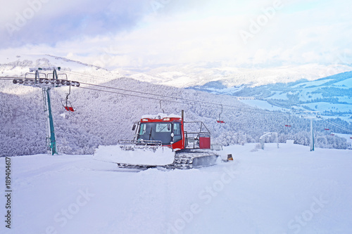 Snowplow machine at ski mountain resort