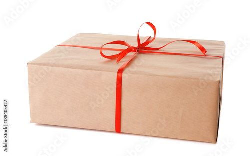 Parcel gift box with red ribbon on white background