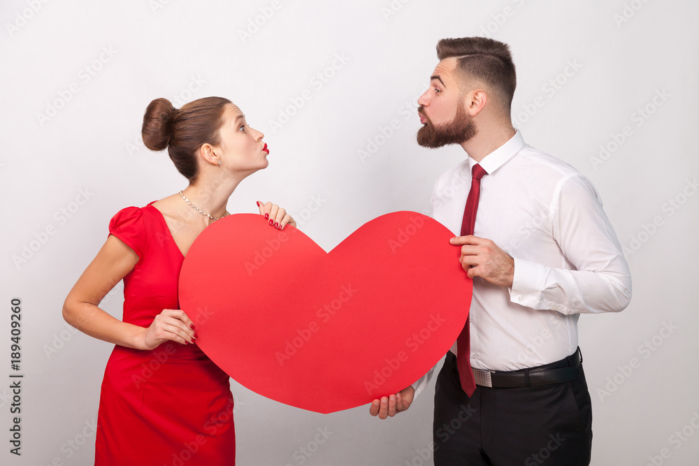 Family celebrate valentine's day, sending each other air kiss Family celebrate valentine's day, sending each other air kiss