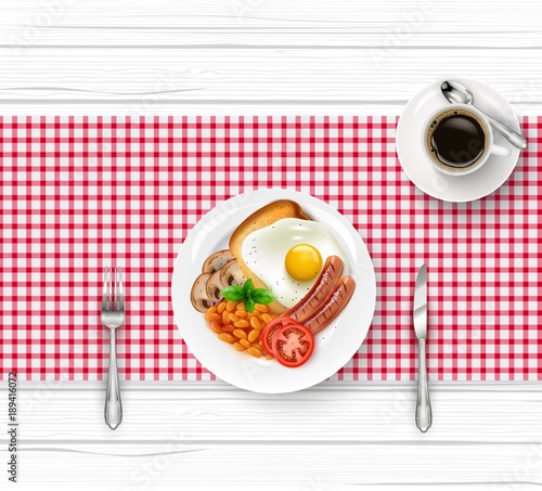 Breakfast table with fried egg and cup of black coffee on wooden table