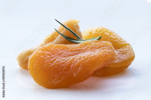 Beautiful and poetic photo of some orangy pretty dried apricot. Close-up macro picture. photo