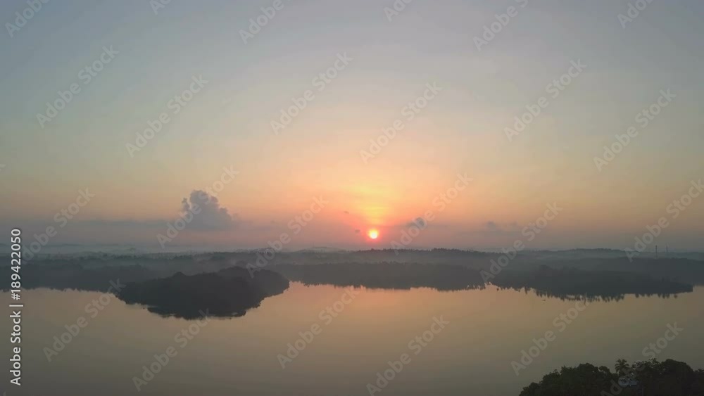 Amazing view of natural lake at colored sunrise ceylon drone footage Amazing view of natural lake at colored sunrise ceylon drone footage