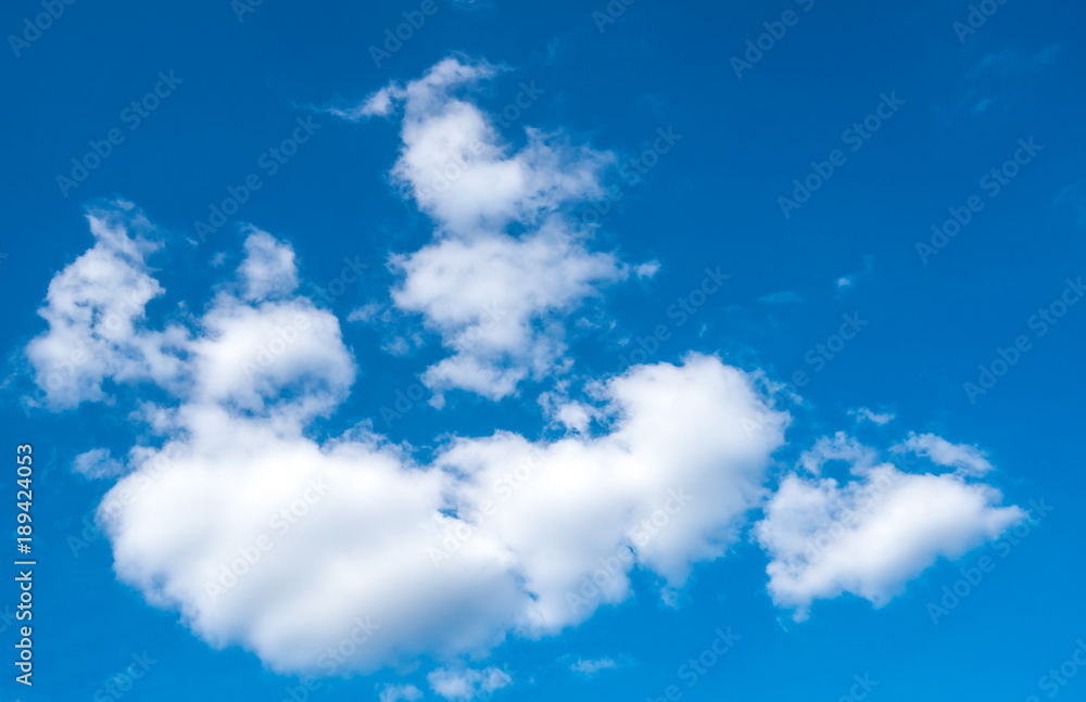 Beautiful white cumulus clouds and blue sky with space Beautiful white cumulus clouds and blue sky with space