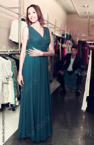 Female customer fitting new dress © JackF