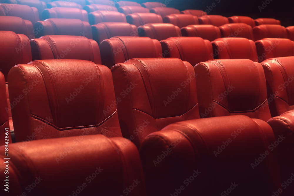 Obraz premium empty theater auditorium or movie cinema with red seats