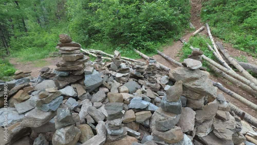 Fairy castle of stones in the forest. Buildings of stone, figures. Balanced stones stand firmly. Taken very close to a wide angle. Fairy castle of stones in the forest. Buildings of stone, figures. Balanced stones stand firmly. Taken very close to a wide angle.
