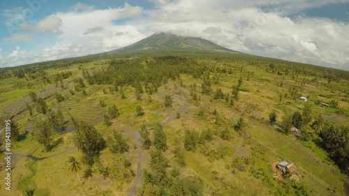 The foot of the Mayon Volcano with flowing mountain rivers near Legazpi city in Philippines. Aerial view Mayon Volcano is an active volcano and 2462 meters high. photo