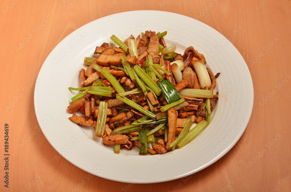 Taiwan's hakka traditional cuisine - Stir fried pork, celery and ucttlefish Taiwan's hakka traditional cuisine - Stir fried pork, celery and ucttlefish