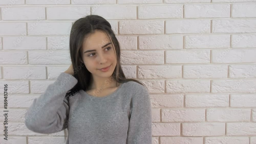 Beautiful teen girl smiling at the camera. Beautiful teen girl smiling at the camera.