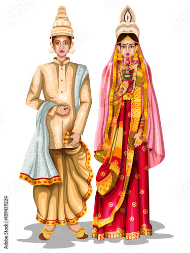 Bengali wedding couple in traditional costume of West Bengal, India